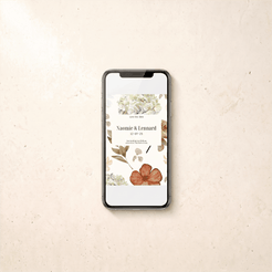 A smartphone lying on a light beige textured surface, displaying a floral 'save the date' card with the names Xiaomie & Lennard and the date 12-07-23.