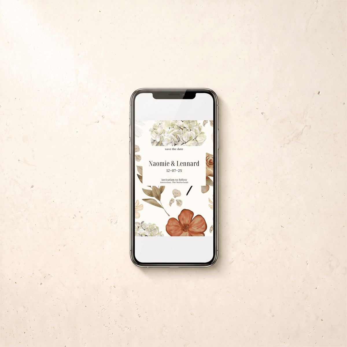 A smartphone lying on a light beige textured surface, displaying a floral 'save the date' card with the names Xiaomie & Lennard and the date 12-07-23.