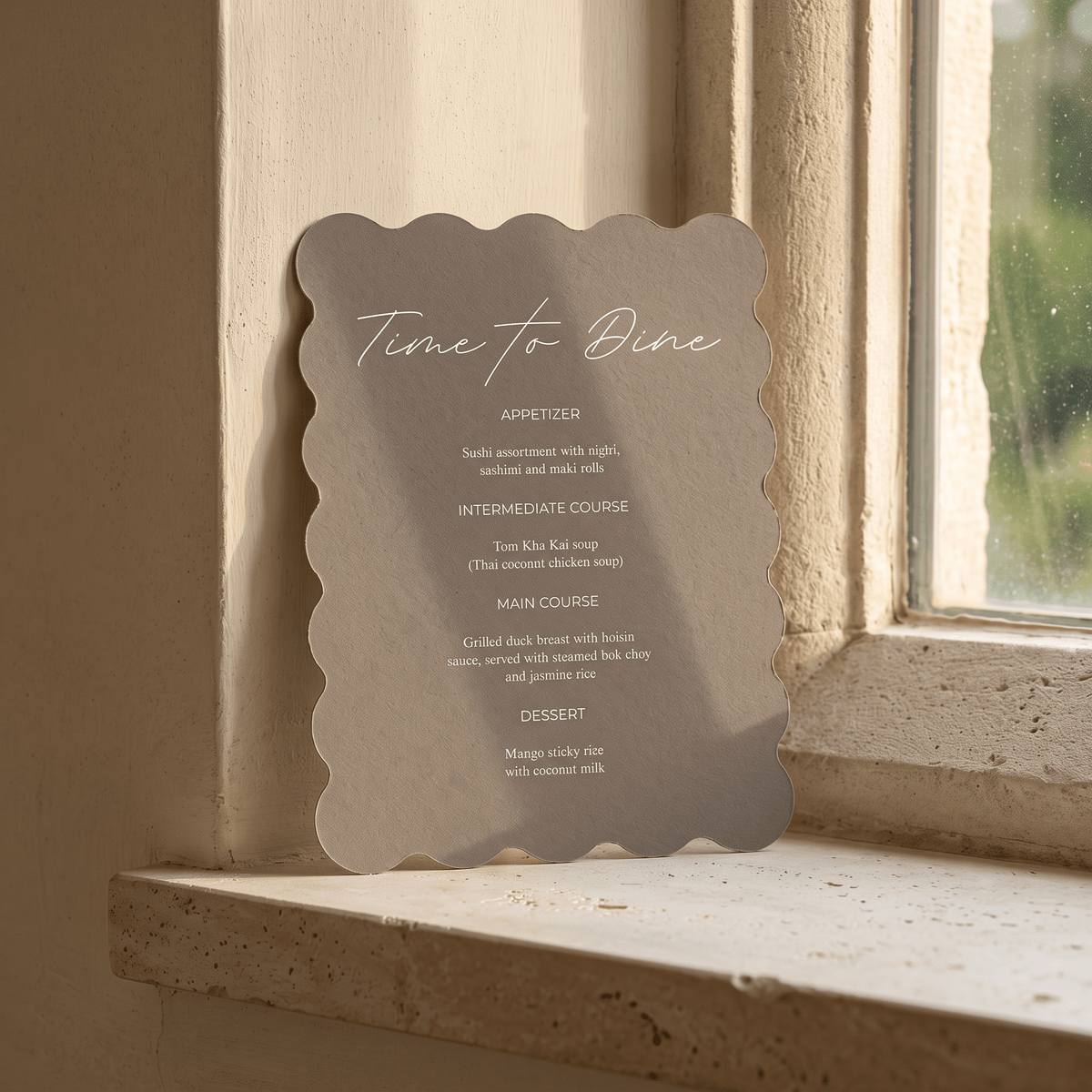 A scalloped-edge anthracite sign with white script reading 'Time to Dine' and a printed menu propped against a beige wall beside a window.