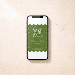 A smartphone lying on a light beige textured surface, displaying a green and white 'Save Our Date' card design.