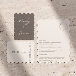 A wedding invitation suite featuring a scalloped-edge card set in taupe and cream, laid flat on a textured beige stone surface. The suite includes a taupe card with white script reading 'Lindy & Simon,' a cream card with event details, and a matching cream date stamp.