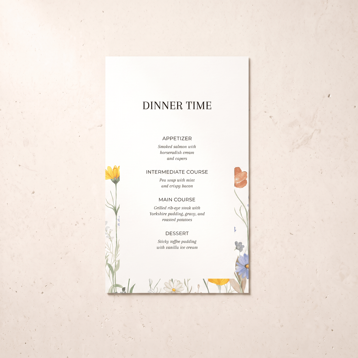 A vertical wedding program or dinner menu card with elegant black typography and delicate watercolor floral illustrations in yellow, orange, blue, and purple, displayed flat on a textured beige surface.