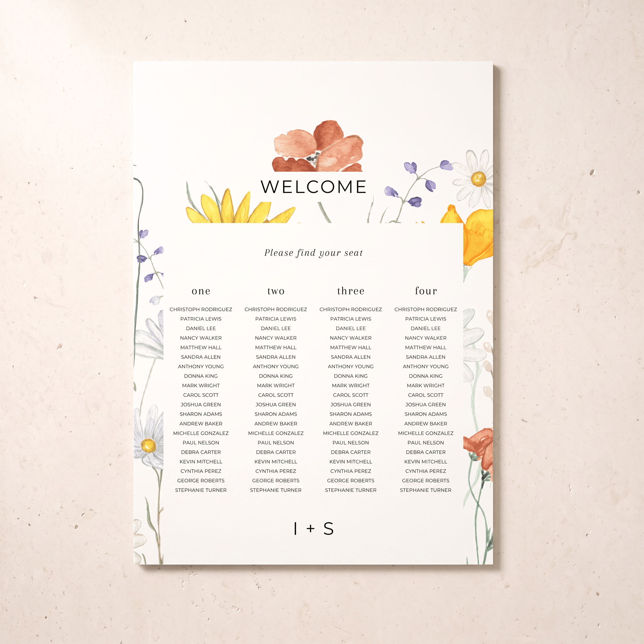 A printed wedding welcome seating card with floral watercolor illustrations in yellow, orange, purple, and blue, displayed against a light beige textured background. The card includes columns for guests numbered one through four and the text 'WELCOME' and 'Please find your seat'.