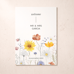 A vertical wedding welcome card with a white background, printed with the text 'welcome', 'MR & MRS GARCIA', and the date '16.november.