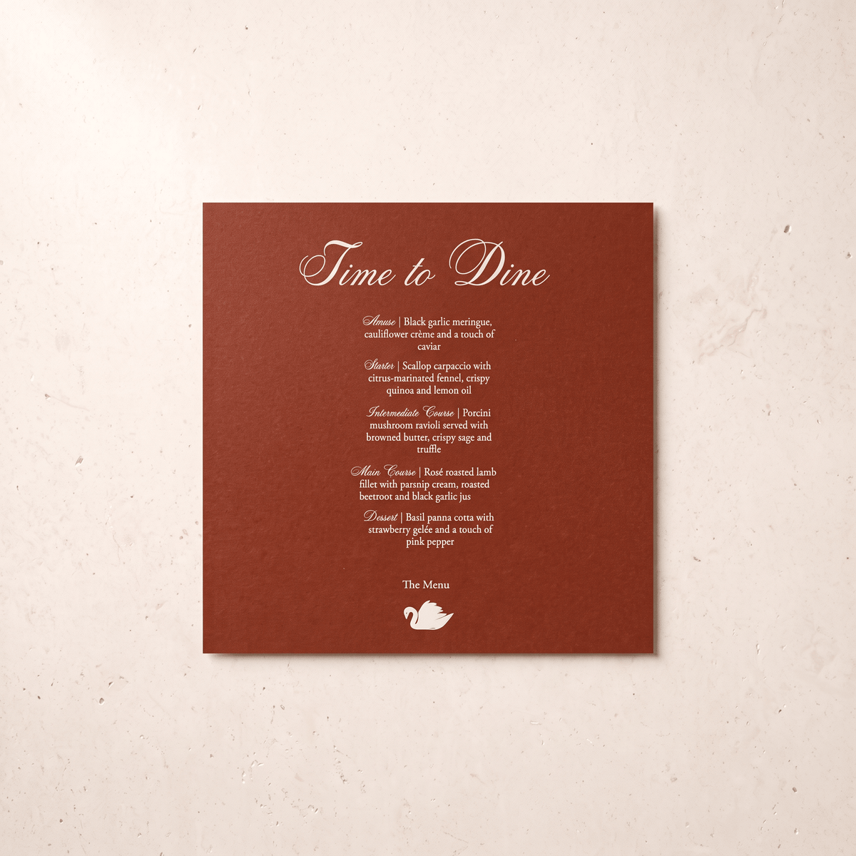 A square brown printed card with elegant white script and menu-style text reading 'Time to Dine' and a small teapot logo, photographed against a light beige textured background.