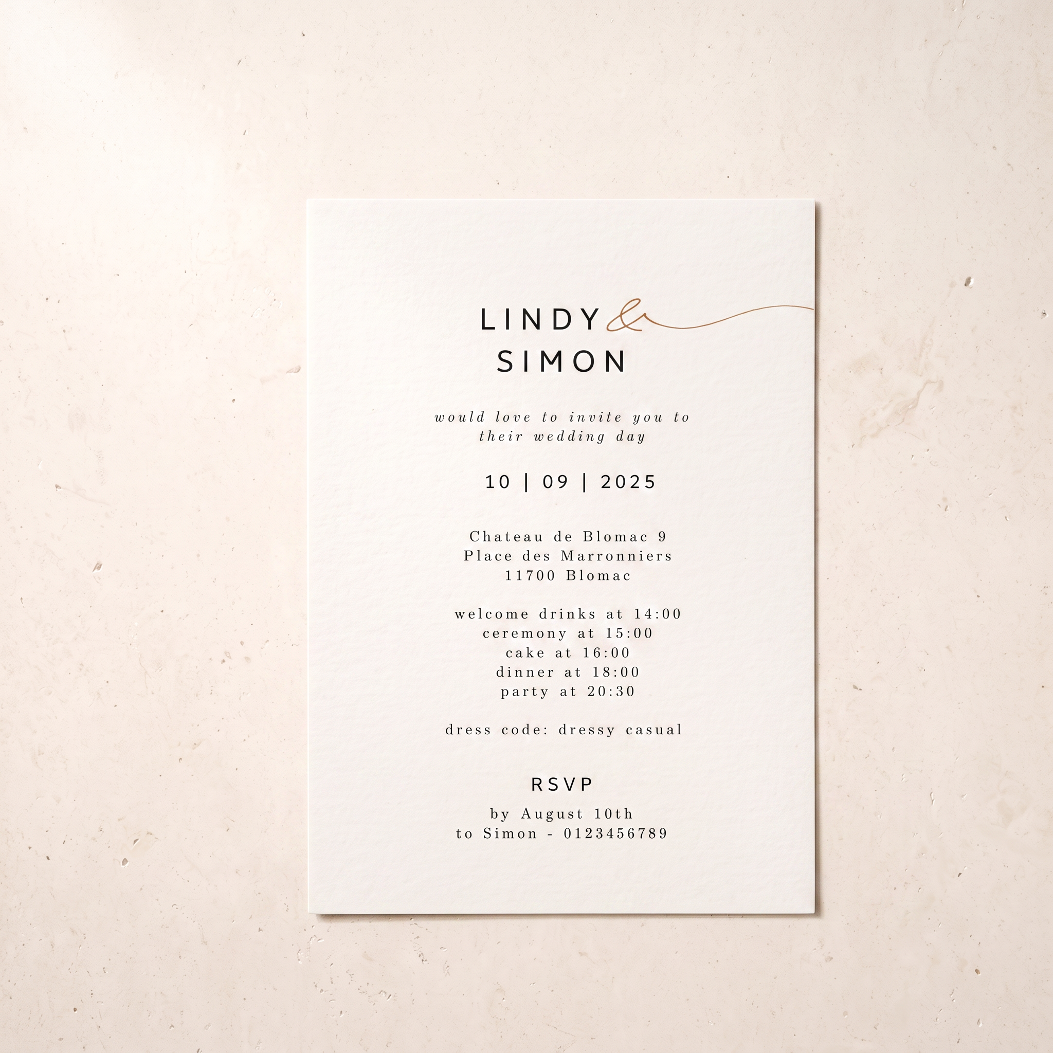 A minimalist wedding invitation card with elegant typography and a delicate gold line accent, displayed flat against a textured beige background.
